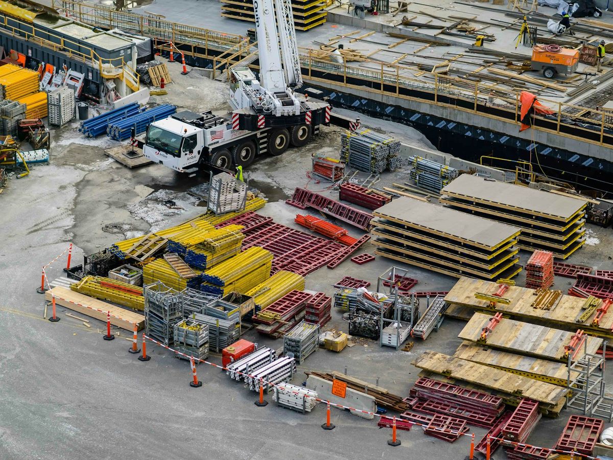 Mega Structure equipment fleet yard with cranes and excavators